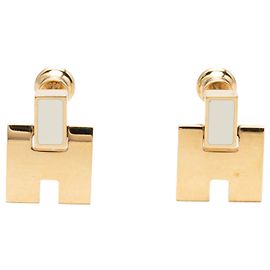 Boucles d'oreilles Eileen Hermès plaquées or et émail Doré