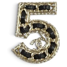 Spilla Chanel B23P No.5 Coco Mark con motivo a catena e strass Nero D'oro