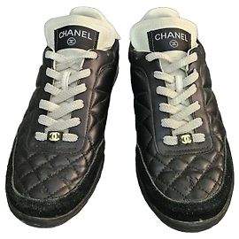 Chanel Sneakers in pelle matelassé e camoscio Nero Bianco