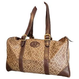 Sac bowling Nina Ricci en cuir et toile monogrammée