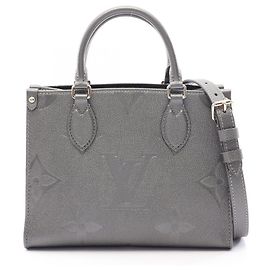 Bolsa Louis Vuitton OnTheGo PM Marrom