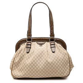 Céline Bolsa Celine Beige Macadam Canvas com borla e fecho Bege