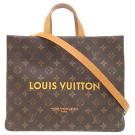 Saco Tote Louis Vuitton em couro Monogram castanho Marrom