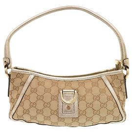 Borsa a tracolla Gucci Abbey GG Canvas Beige D'oro