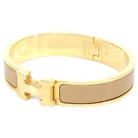 Hermès Pulsera Charm Hermes Click H PM Beige Dorado