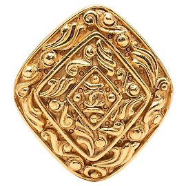 Broche Chanel CC plaquée or avec gravure diamant Doré