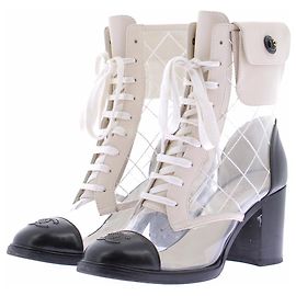 Chanel Bottes en PVC et cuir Noir