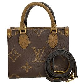 Louis Vuitton Monogram Giant Reverse OnTheGo BB Handtasche Braun