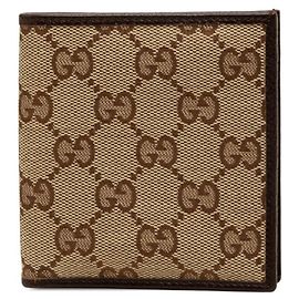Cartera bi-fold Gucci GG Canvas Beige