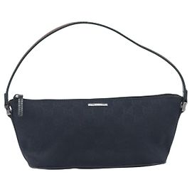 Pochette con zip Gucci in GG Canvas Nero