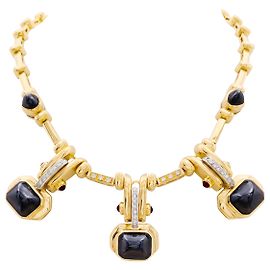 Autre Marque Colar de ouro amarelo, hematites pain de sucre, rubis e diamantes. Outro
