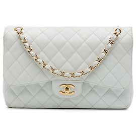 Chanel White Jumbo Classic Caviar Double Flap Bianco