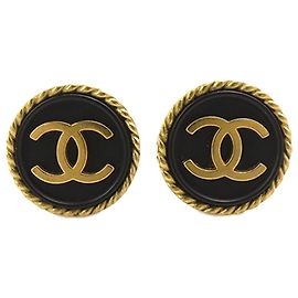 Boucles d'oreilles clips rondes Chanel Black CC plaquées or et émail Noir