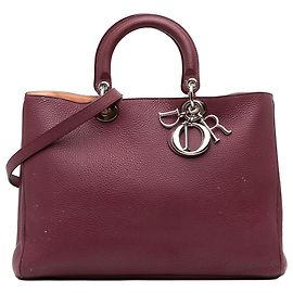 Bolso Diorissimo Dior de piel rojo Large Roja Burdeos