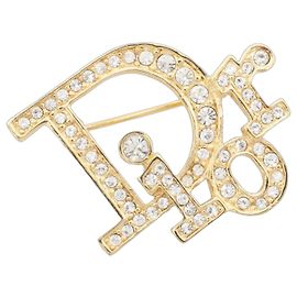 Broche vintage em ouro Christian Dior Dourado
