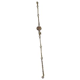 Pulsera Gucci Double G Key en metal dorado Dorado