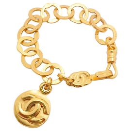 Bracelet à breloques plaqué or Chanel Doré
