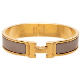 Brazalete Hermès Click H PM Dorado Gris