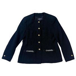 Giacca Chanel in lana nera con bottoni dorati Nero