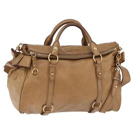 Sac à main Miu Miu en cuir 2 voies Beige Gold Auth 167657M Beige Doré