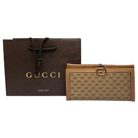 Cartera Vintage Gucci GG Supreme Bifold c. 2010 Beige Brown Beige