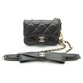 Chanel Mini borsa a tracolla convertibile in nappa matelassé con nastro e catena Nero