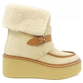 Stivali in shearling Hermès Hemisphere Marrone Bianco Beige