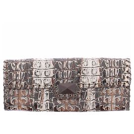 Autre Marque Bolso de mano de cuero estampado Castaño