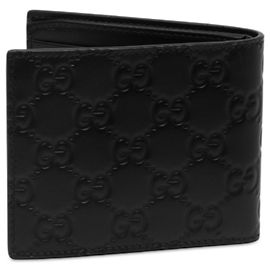 Carteira bifold Gucci em couro de bezerro com emblema GG em relevo preta Preto