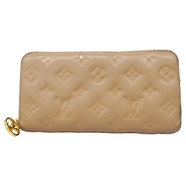 Louis Vuitton Monogram Coussin Zippy Wallet in Taupe Taupe