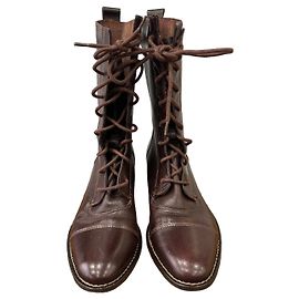 Autre Marque Botas stringadas de cuero marrón Castaño