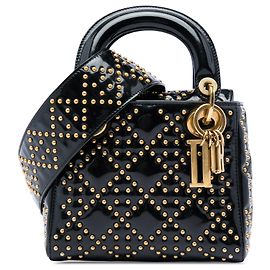 Dior Mini Lady Dior Supple en cuir verni noir avec clous Cannage Noir