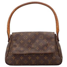 Sac Pochette Accessoires en toile Monogram Louis Vuitton Marron