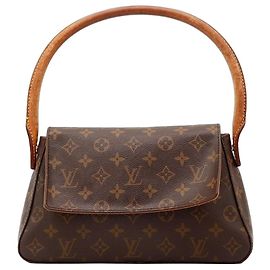 Bolso Pochette Accessoires Monogram Canvas Louis Vuitton Castaño Monograma