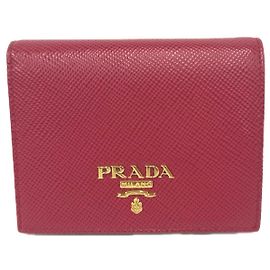 Cartera bi-fold de piel Saffiano con logo PRADA Roja