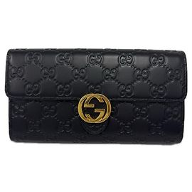 Cartera Continental Gucci de piel con G entrelazadas Negro