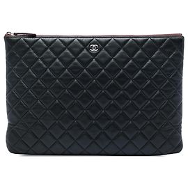 Chanel Black Large Quilted Lambskin O Case Clutch Black