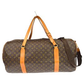 Louis Vuitton Sac Polochon Monogram Canvas 65 Marrone