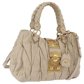 Bolsa de mão Miu Miu Matelassé em couro 2way Beige Gold Auth 167655A Bege Dourado