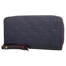 Carteira Zippy Monogram Empreinte Louis Vuitton Vermelho