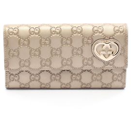 Cartera larga bi-fold Gucci Lovely Guccissima Dorado