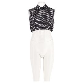Autre Marque Top senza maniche a pois bianco e nero FRAME in cotone Nero