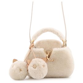Sac à main Louis Vuitton Capsneau Capucines en shearling Écru