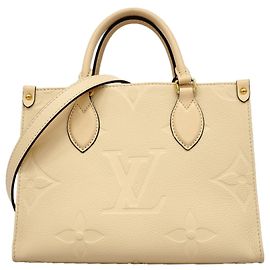 Borsa Louis Vuitton Monogram Empreinte OnTheGo PM Crudo