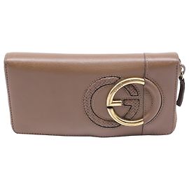 Gucci Interlocking G Long Wallet mit Rundum-Reißverschluss aus braunem Leder Braun Rot