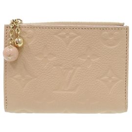 Louis Vuitton Portefeuille Lisa Monogram Empreinte Bi-Fold Wallet Beige