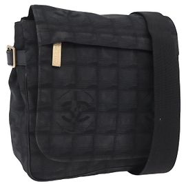 Borsa a tracolla CHANEL New Travel Line in tela nera e oro CC Auth 208770A Nero D'oro