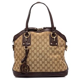Sac à main Dome Medium GG Canvas avec breloque Gucci Beige Beige