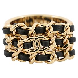 Anello a fascia Chanel in pelle dorata e metallo D'oro