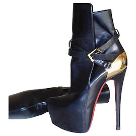 Christian Louboutin Black leather high heel boots with gold details Black Golden